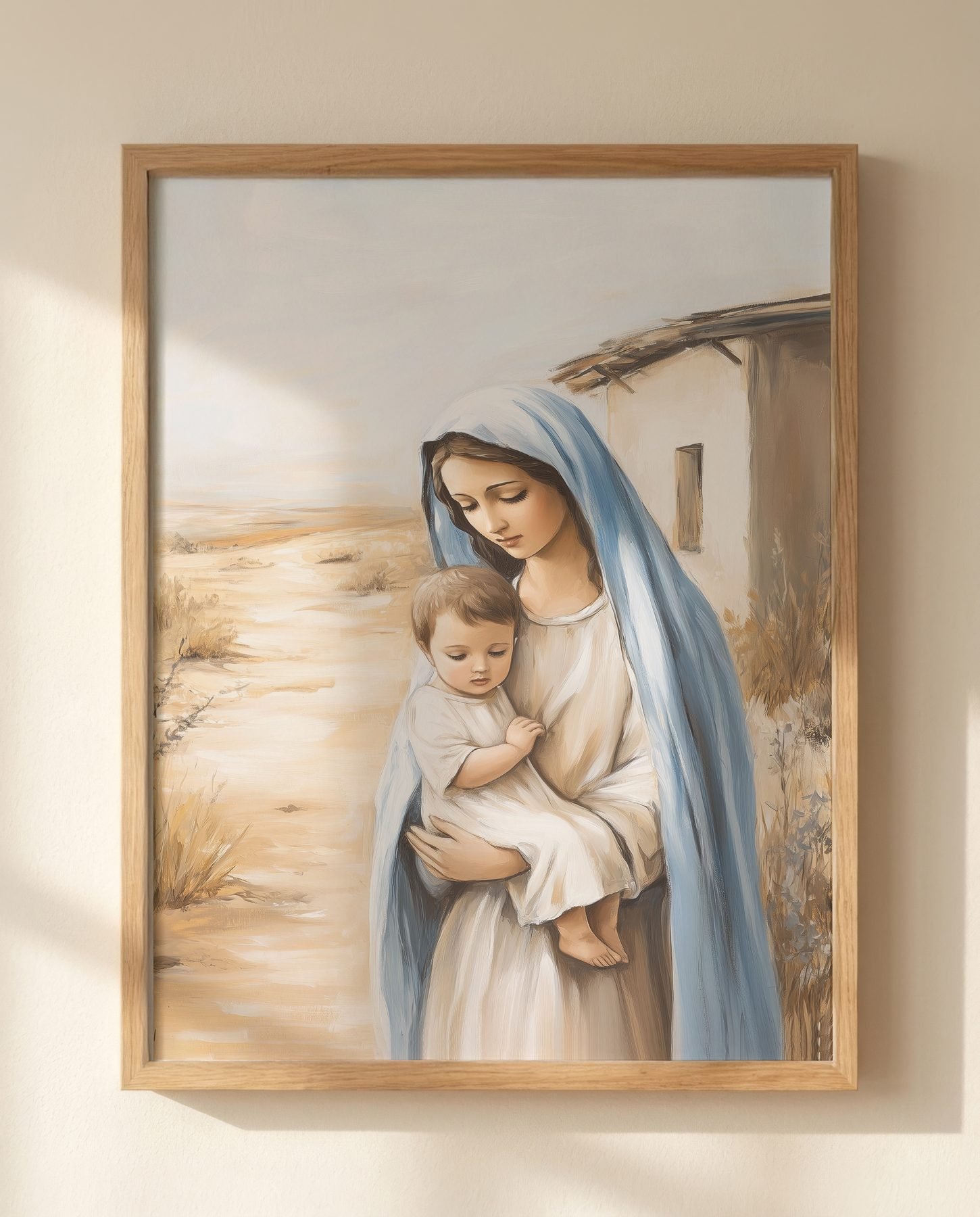 Mary and Jesus print on sunlit dresser